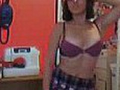 Hot dark brown all natural dilettante girl stripping down in her little room on her webcam.