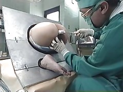 Take a look at what's going on here. A pretty Nippon honey is the subject of an experiment and she can't do no thing except obey and allow the scientist to do his job. This chab inserts different liquids in her ass, filling her up. Why is she here and what's happening? Let's find out!